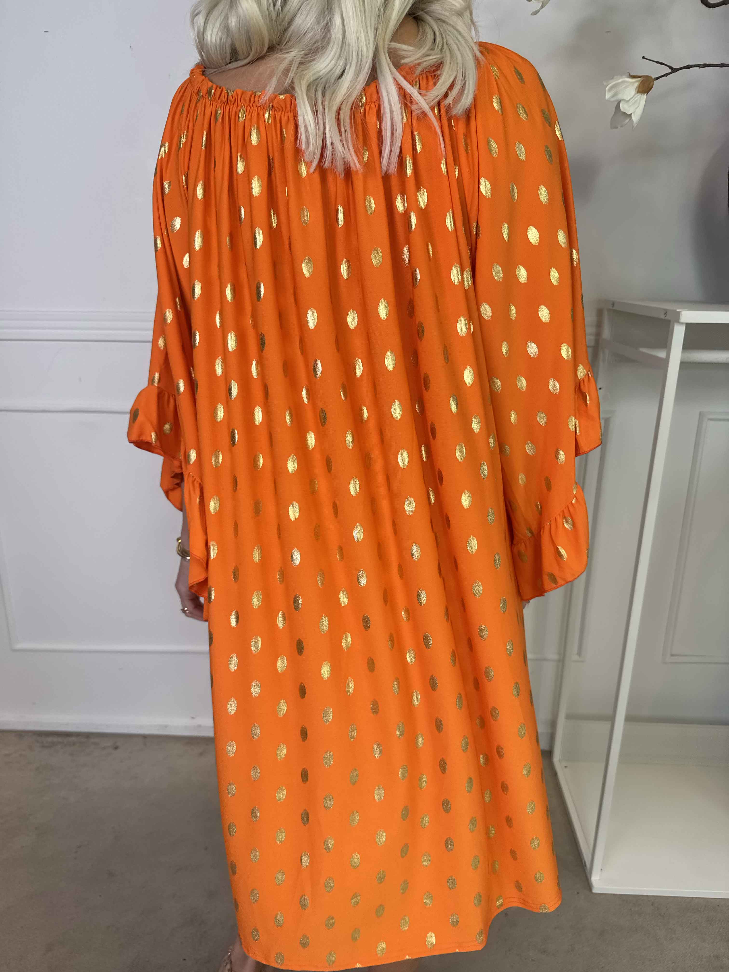 Yasma - Elastisk tunikaklänning med guldprickar och volangärmar